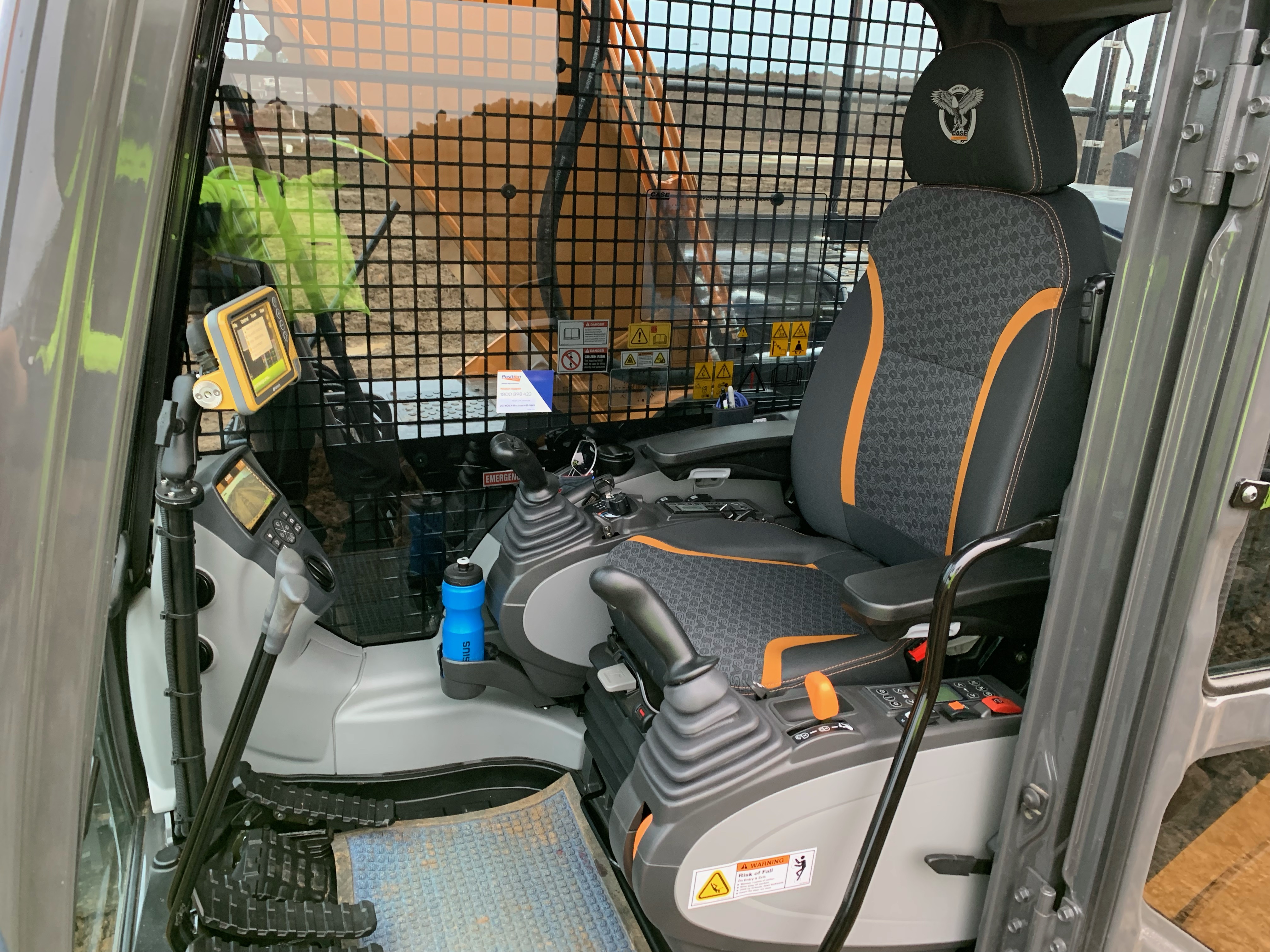 Inside the cabin of the excavator